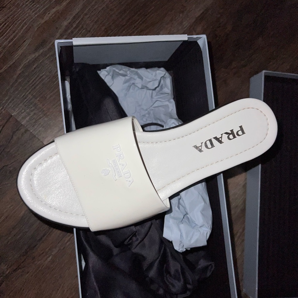 Prada sandals.